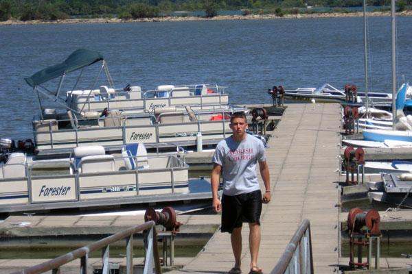 a man walking on a dock