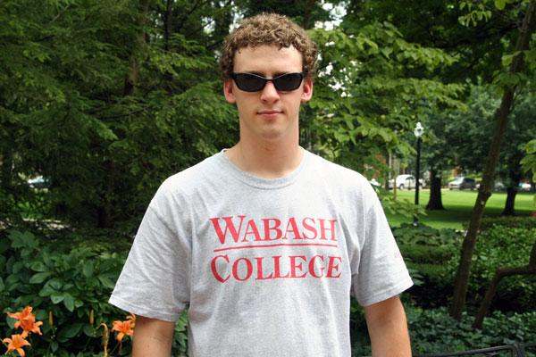 a man wearing sunglasses and a t-shirt