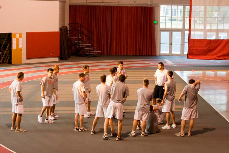 a group of men in a gym