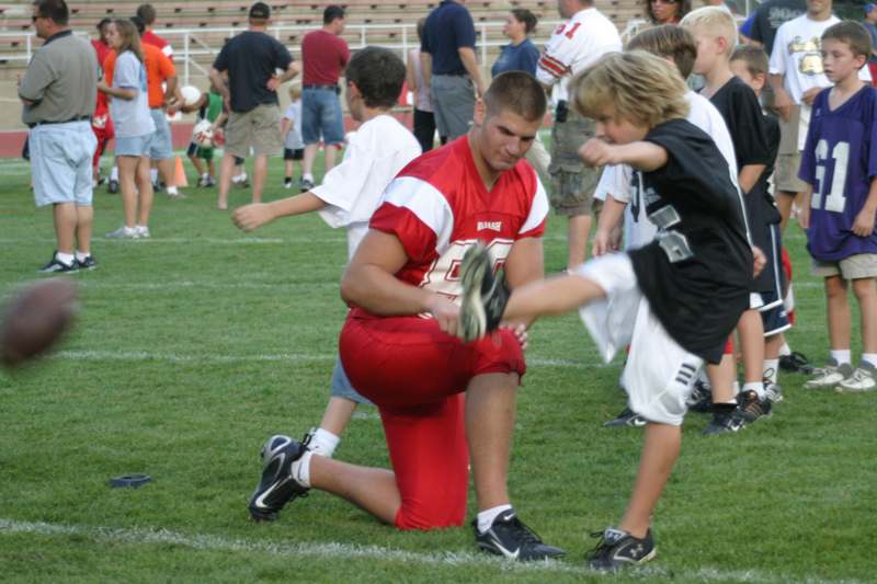 a football player kneeling on his knee
