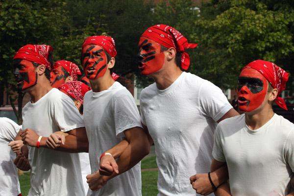 a group of men with face paint