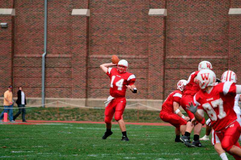 a group of people playing football