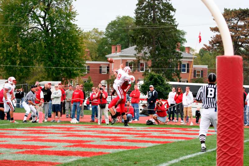 a football player catching a football