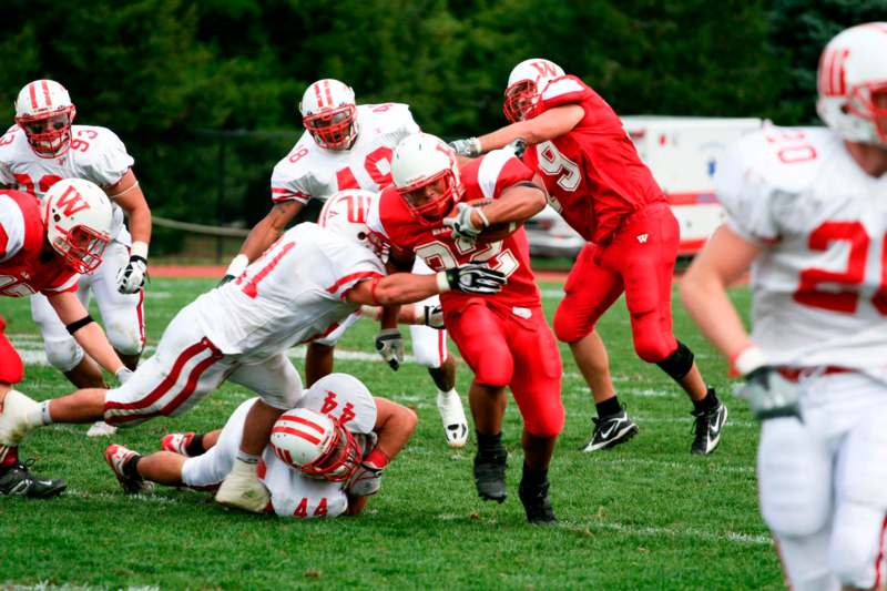 a group of football players on a field