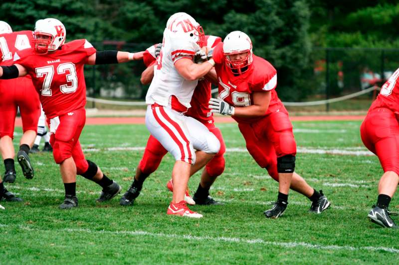 a group of football players on a field