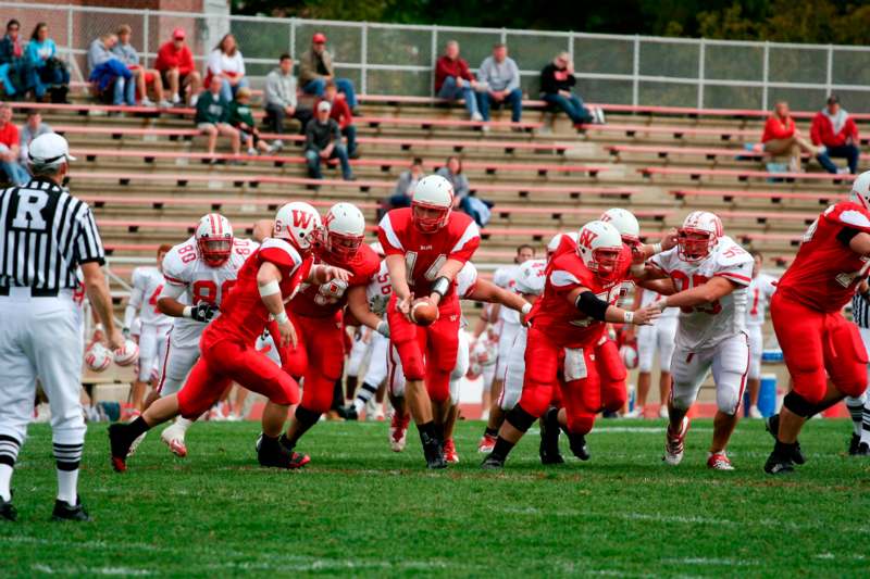 a group of football players on a field