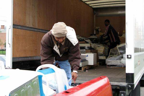 a man loading a truck