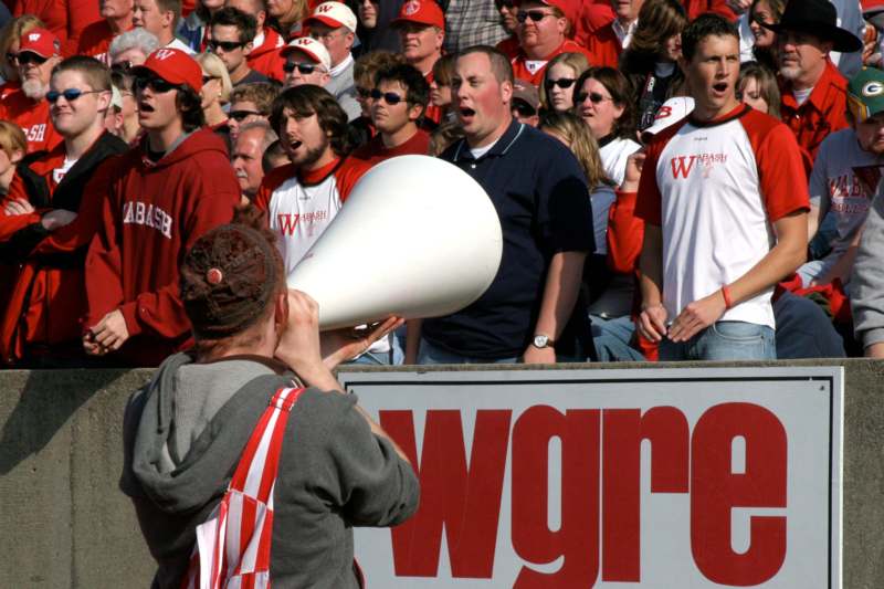 a man shouting into a megaphone