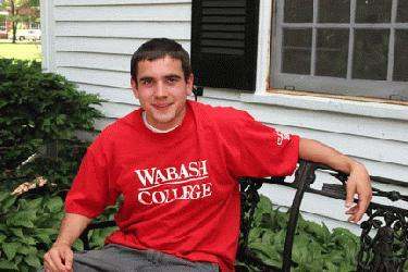 a man sitting on a bench
