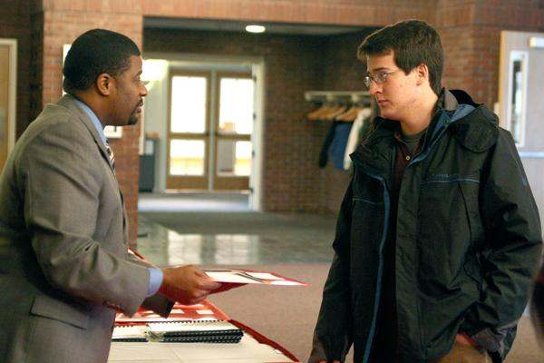 a man talking to a man