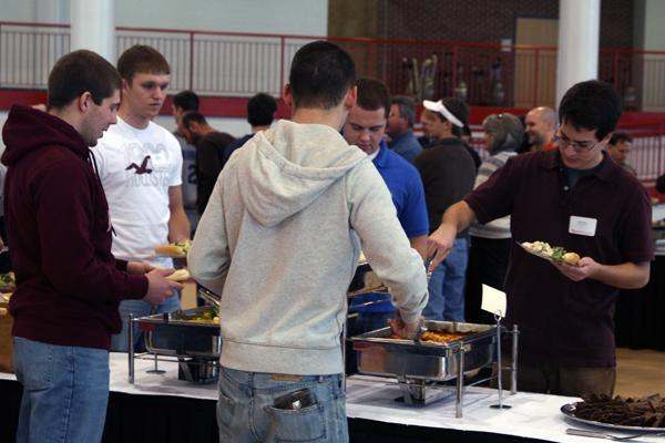 a group of people at a buffet