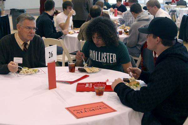a group of people eating at a table