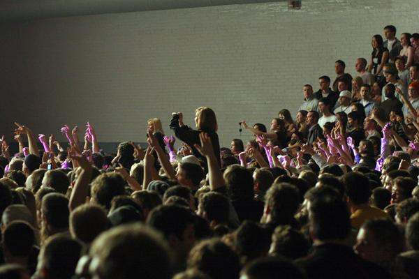 a crowd of people in a concert