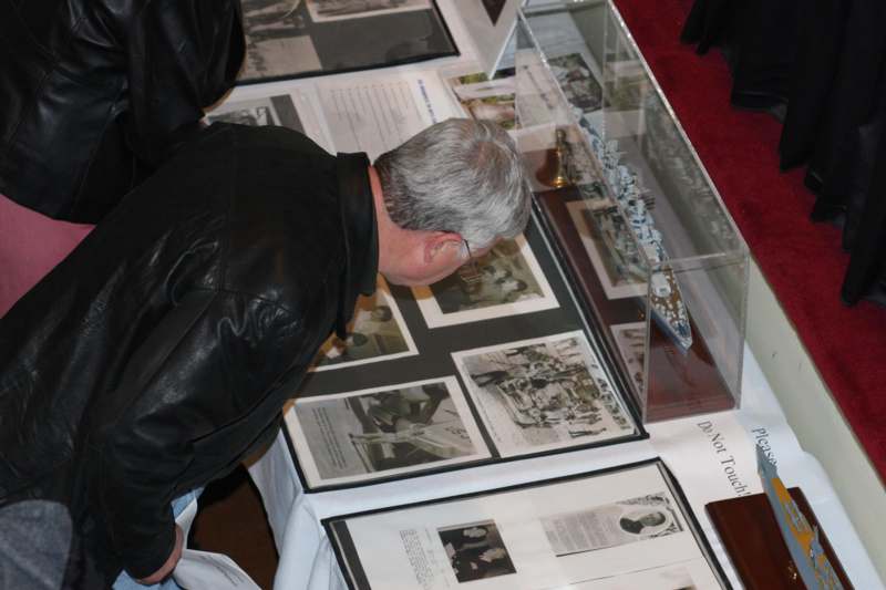 a man looking at a display