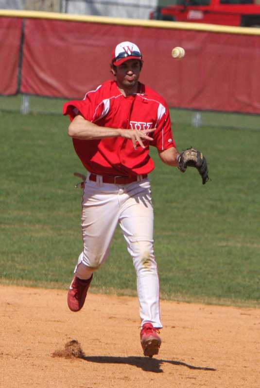 a baseball player running on a field