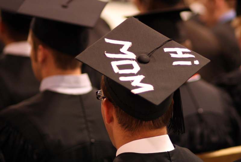 a person wearing a graduation cap