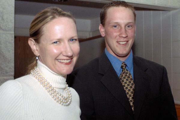 a man and woman smiling