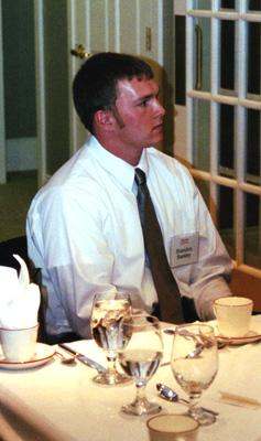 a man in a white shirt and tie