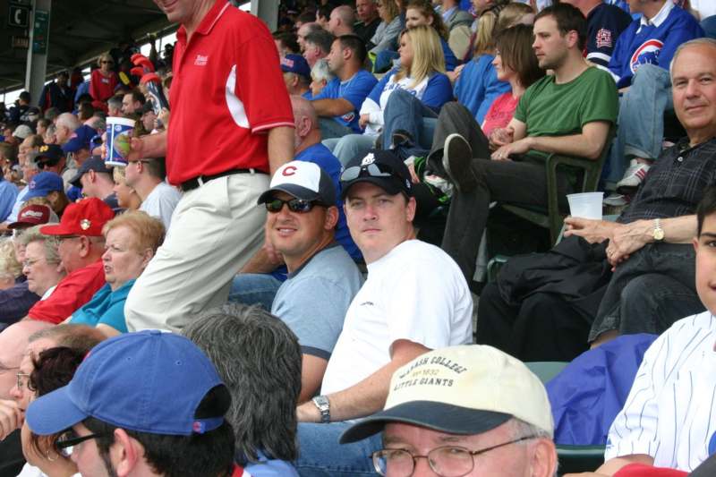 a group of people sitting in stands