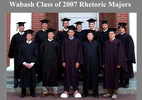 a group of graduates posing for a photo