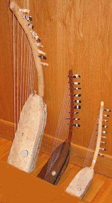 a pair of harps leaning against a wall