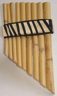 a pan flute with black straps