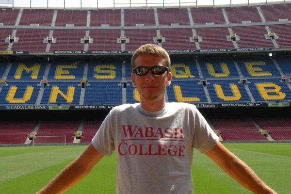 a man standing in a stadium