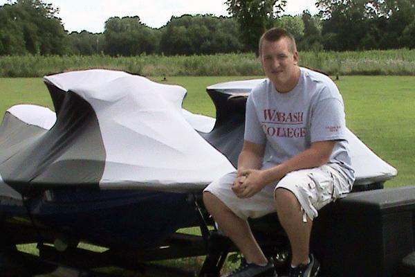 a man sitting on a jet ski