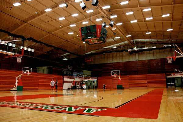a basketball court with a basketball hoop and a basketball hoop
