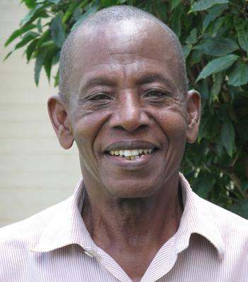 a close-up of a man smiling