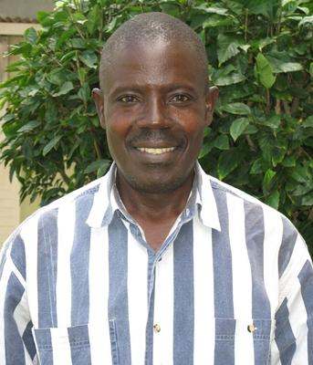 a man smiling for a picture