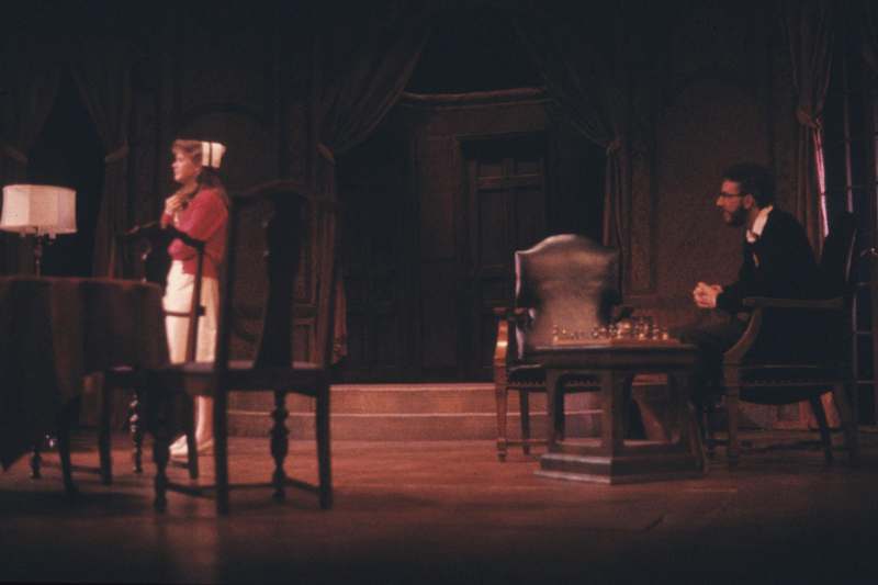 a man and woman on a stage