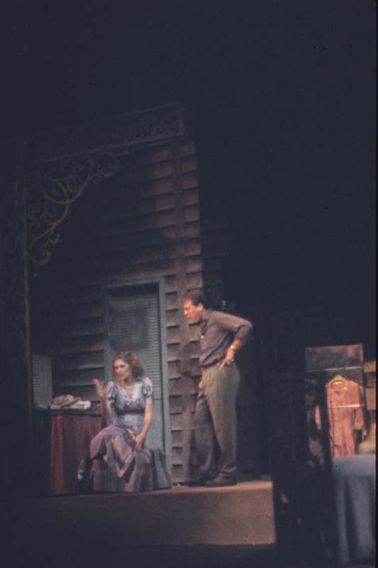a man and woman on stage
