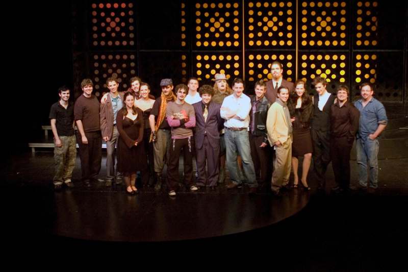 a group of people standing on a stage