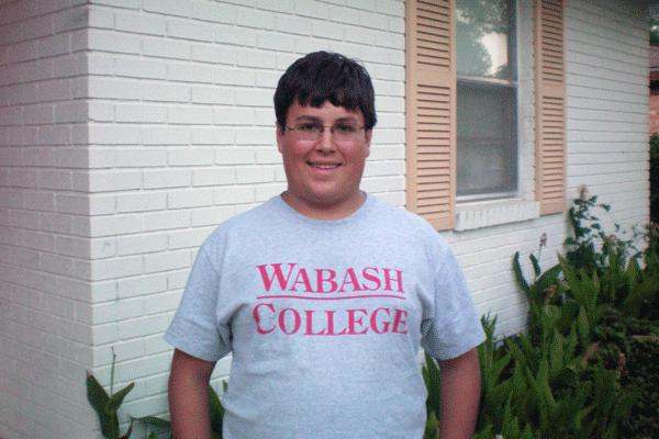 a man wearing a grey shirt