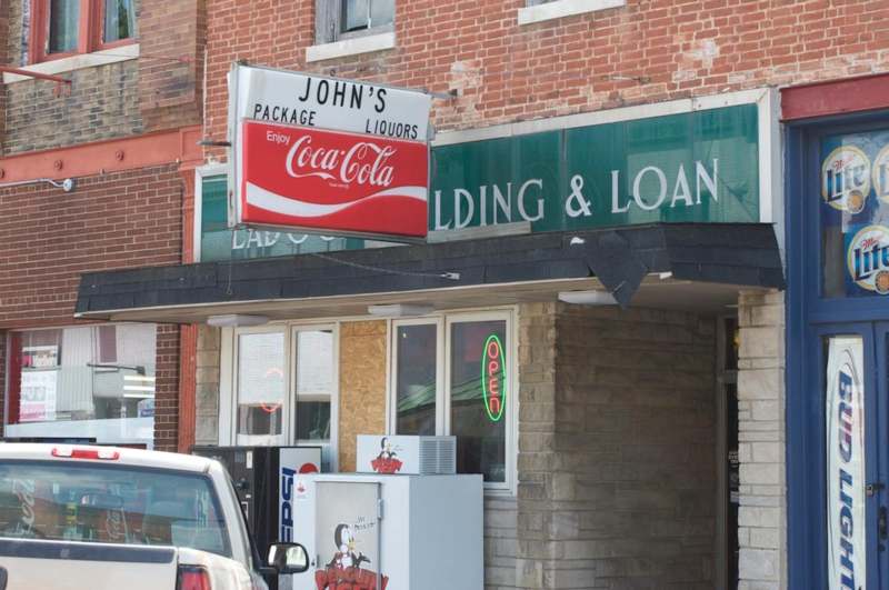 a store front with a sign