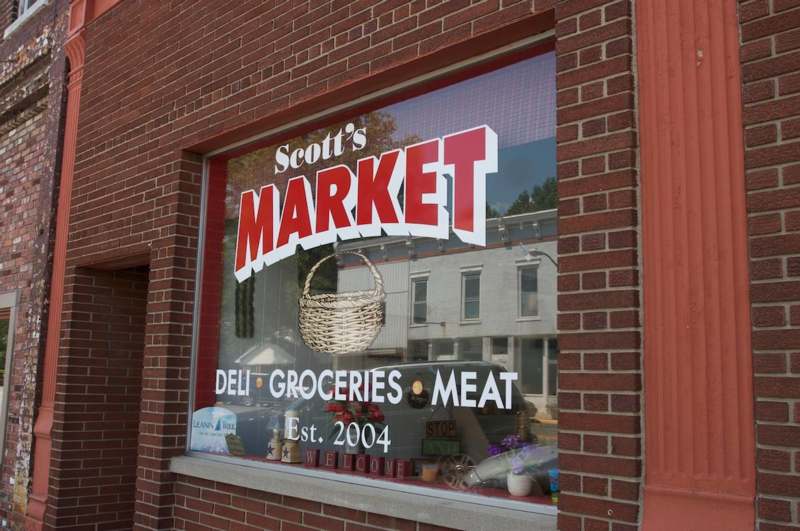 a store window with a sign