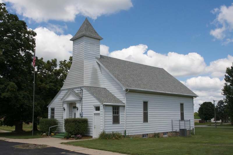 a white church with a steeple