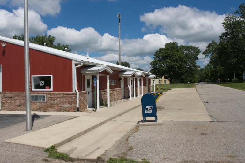 a mailbox next to a building