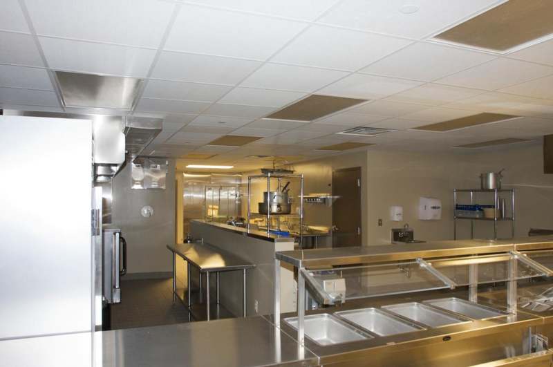 a kitchen with stainless steel appliances