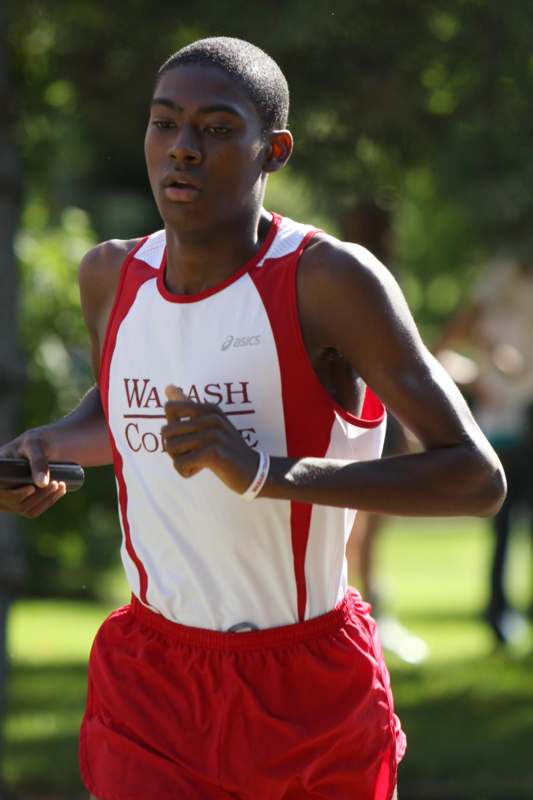 a young man running in a race
