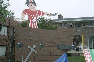 a pirate ship with a cut out of a paper cut out of a cartoon character