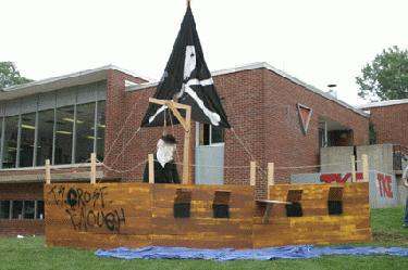 a pirate ship with a flag