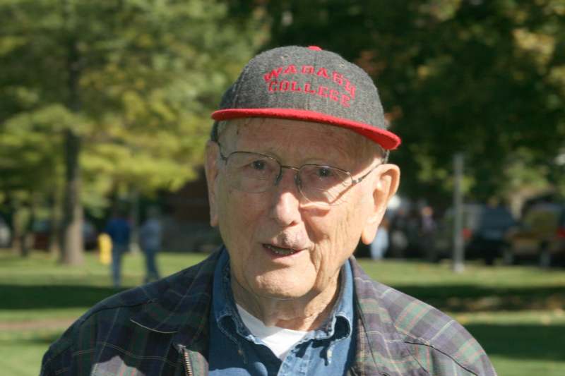 an old man wearing a hat