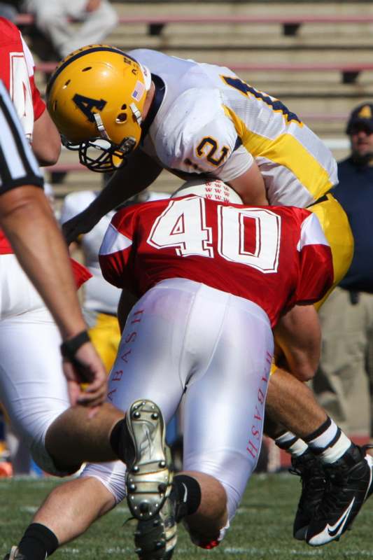 a football player in a red and white uniform