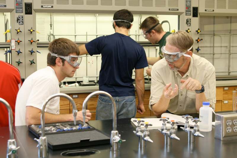 a group of people wearing safety goggles