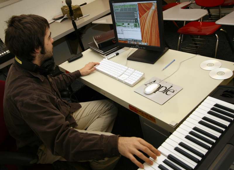 a man playing a keyboard