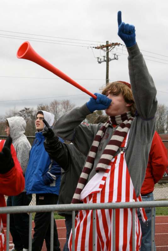 a person blowing a horn