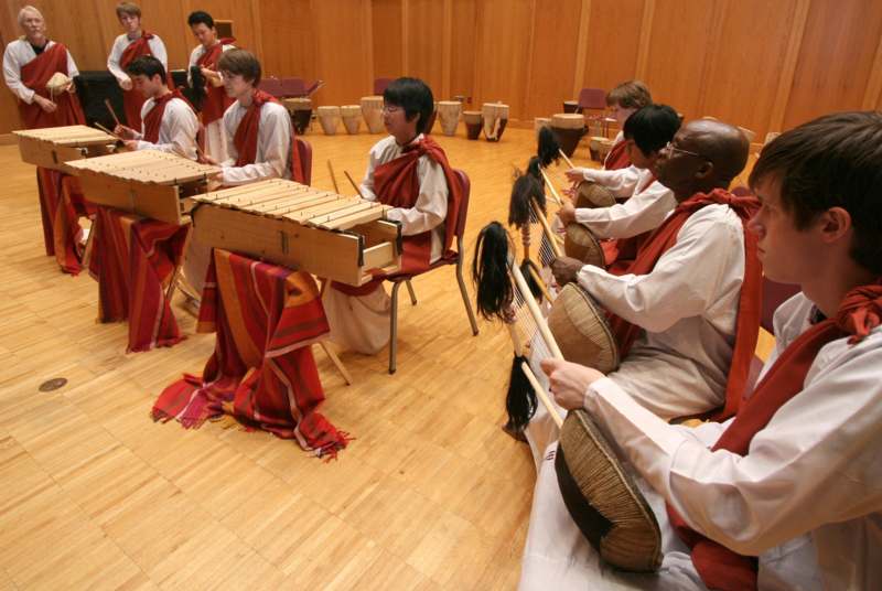 a group of people playing instruments