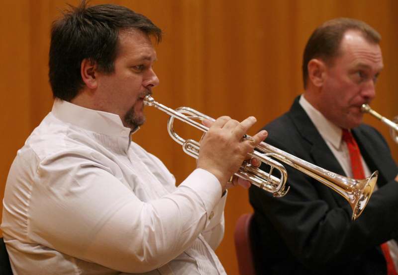 a man playing a trumpet